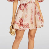 Floral print mini dress with puff sleeves, V-neck, and matching belt in pink tones — ZIMMERMANN | Endless UAE