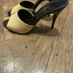 Beige canvas LA 16 mules with black leather trim and heel — Yves Saint Laurent | Endless UAE