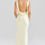 Elegant pale yellow satin maxi dress with dramatic open back and cowl neck draping detail — House of CB | Endless UAE