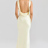 Elegant pale yellow satin maxi dress with dramatic open back and cowl neck draping detail — House of CB | Endless UAE
