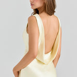 Elegant pale yellow satin maxi dress with dramatic open cowl back and sleeveless design — House of CB | Endless UAE