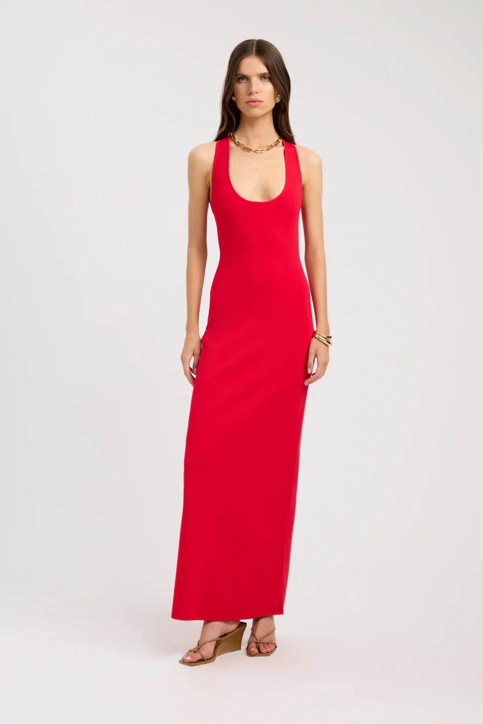 Woman wearing red sleeveless maxi dress with scoop neckline and cross back detail — Kookai | Endless UAE