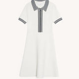 White knitted polo dress with black striped collar and trim details — Sandro | Endless UAE