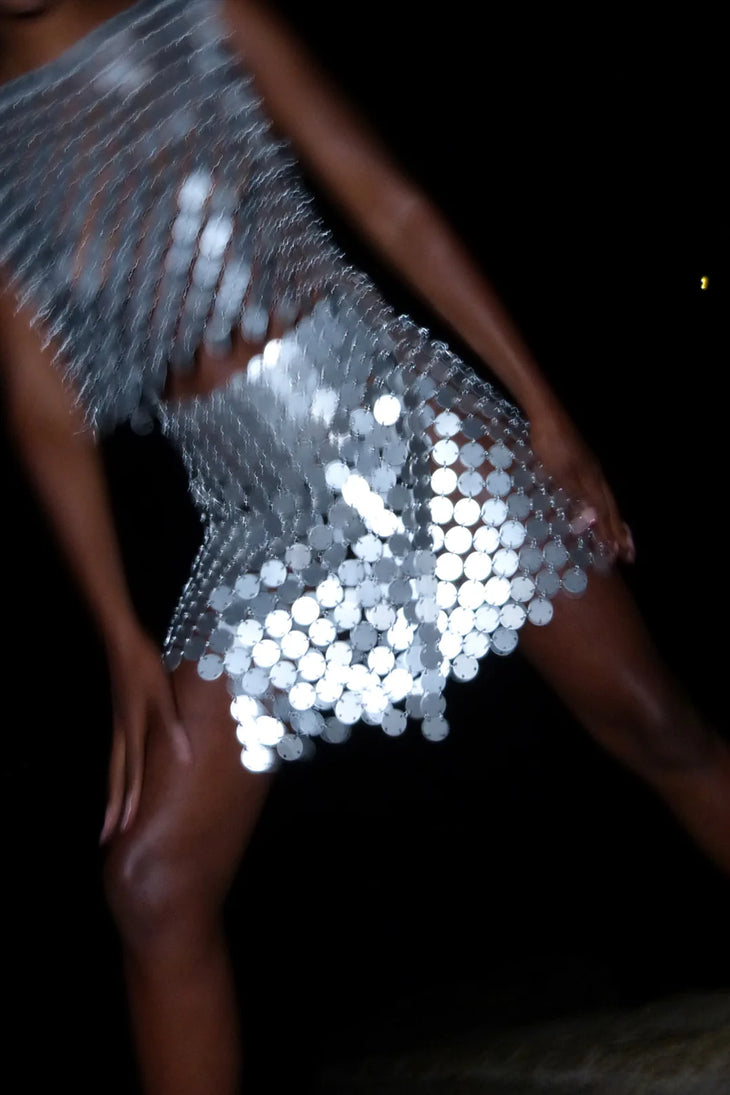 Silver sequin embellished skirt with mesh overlay detail worn on model — Isabel Moore | Endless UAE