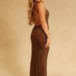 Jasmyn Hot Fix Maxi Dress With Mesh Back in bronze worn by woman against beach backdrop — Meshki | Endless UAE
