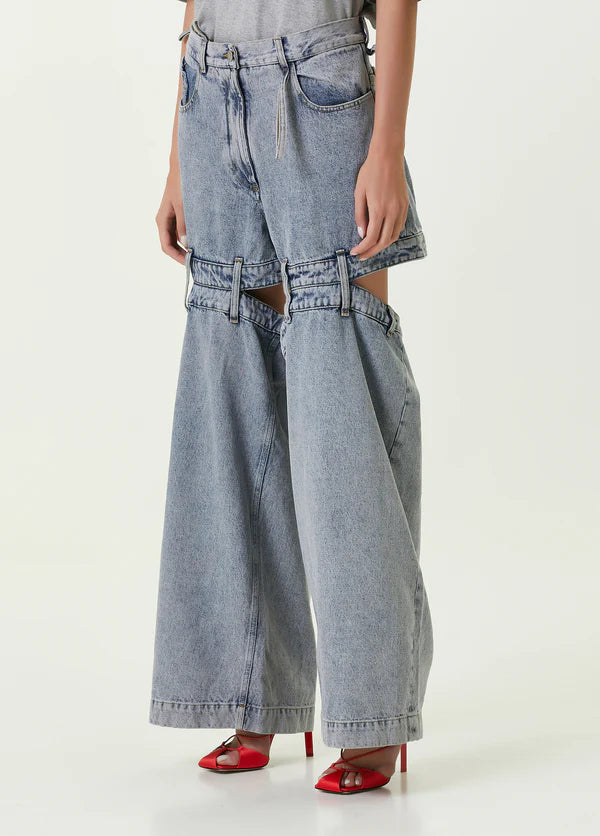 Ashton Cut-out Jeans in light blue denim with strategic knee and thigh cutouts — Attico | Endless UAE
