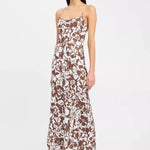 Maxi dress with brown and white floral print, thin shoulder straps, and A-line silhouette — Kookai | Endless UAE
