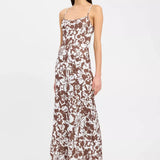 Maxi dress with brown and white floral print, thin shoulder straps, and A-line silhouette — Kookai | Endless UAE