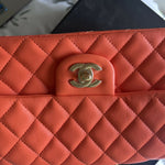 Coral quilted lambskin mini classic handbag with gold CC logo — Chanel | Endless UAE