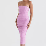 Model wearing Tana Pink strapless corset midi dress with textured fabric and body-con fit — House of CB | Endless UAE