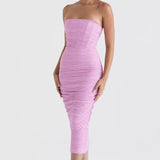 Model wearing Tana Pink strapless corset midi dress with textured fabric and body-con fit — House of CB | Endless UAE