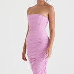 Model wearing pink strapless corset midi dress with textured fabric and body-hugging silhouette — House of CB | Endless UAE