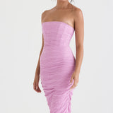 Model wearing pink strapless corset midi dress with textured fabric and body-hugging silhouette — House of CB | Endless UAE
