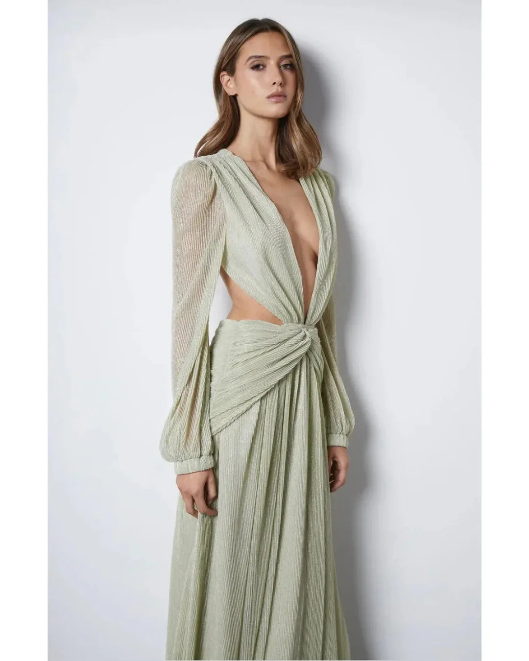 Woman wearing The Goddess Green Dress by Anne Louise Boutique — Endless UAE