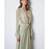 Woman wearing The Goddess Green Dress by Anne Louise Boutique — Endless UAE