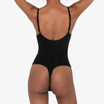 Beige thong bodysuit with adjustable straps and compression panels — Underhance | Endless UAE