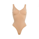 Beige thong bodysuit with adjustable straps and compression panels — Underhance | Endless UAE