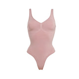 Beige thong bodysuit with adjustable straps and compression panels — Underhance | Endless UAE