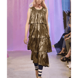 Metallic gold tiered plisse party dress with striped leggings on runway model — Baum Und Pferdgarten | Endless UAE