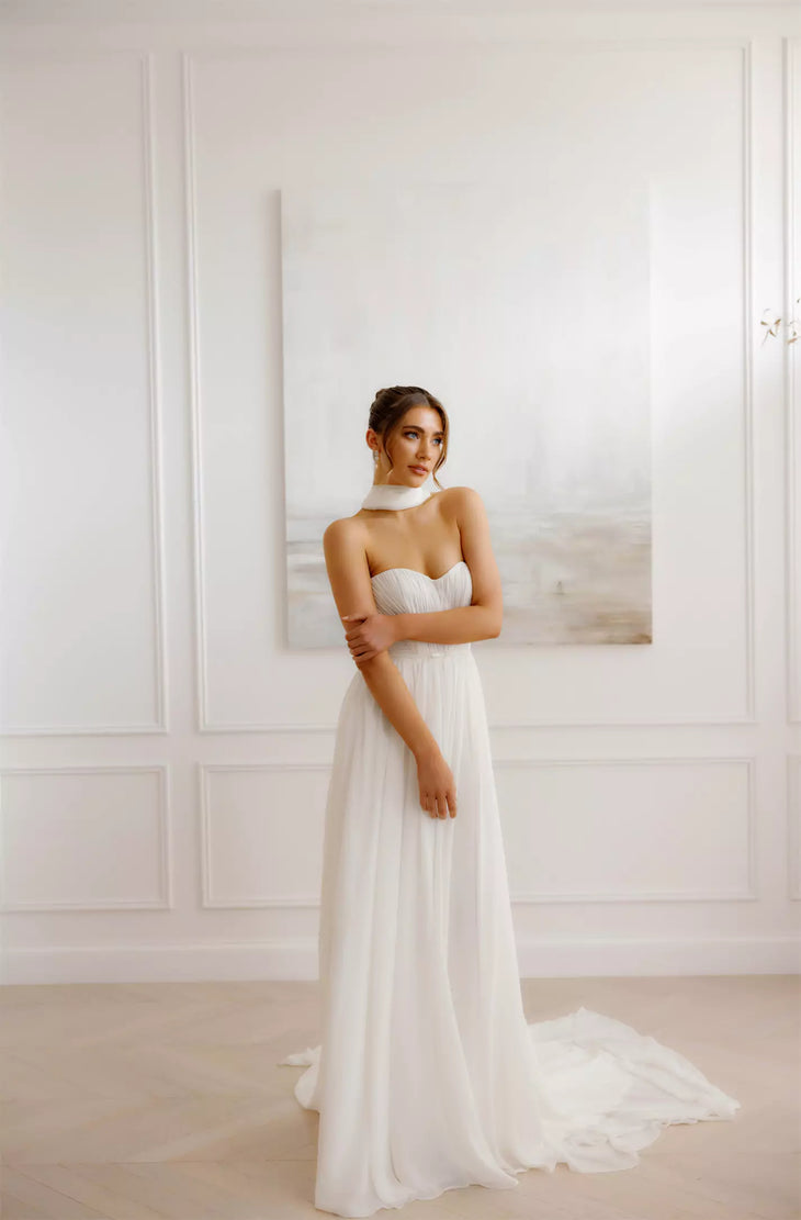 Ethereal strapless wedding gown with sweetheart neckline and flowing tulle skirt in elegant white — You&I Bridal | Endless UAE