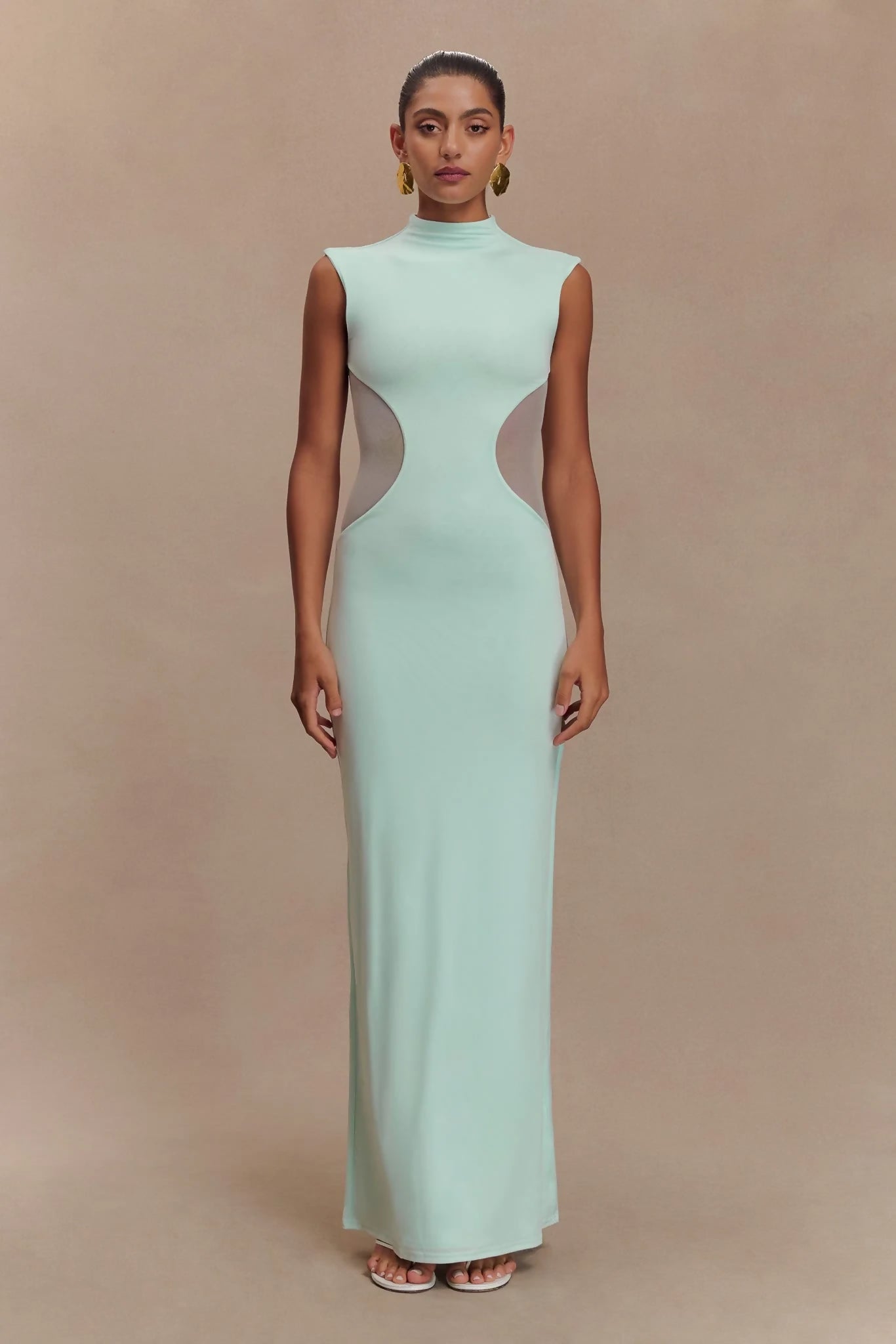 Mint green sleeveless maxi dress with mesh side cutouts and high neckline — Endless | Endless UAE
