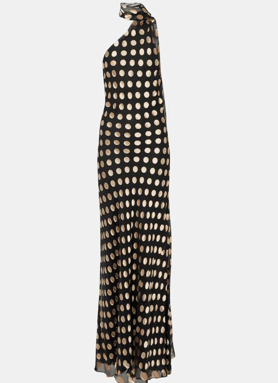 Black polka-dot one-shoulder maxi dress with flowing silhouette and knotted shoulder detail — Alexandra Miro | Endless UAE