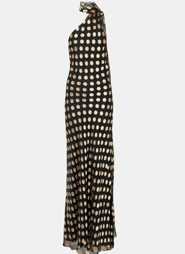 Black polka-dot one-shoulder maxi dress with flowing silhouette and knotted shoulder detail — Alexandra Miro | Endless UAE