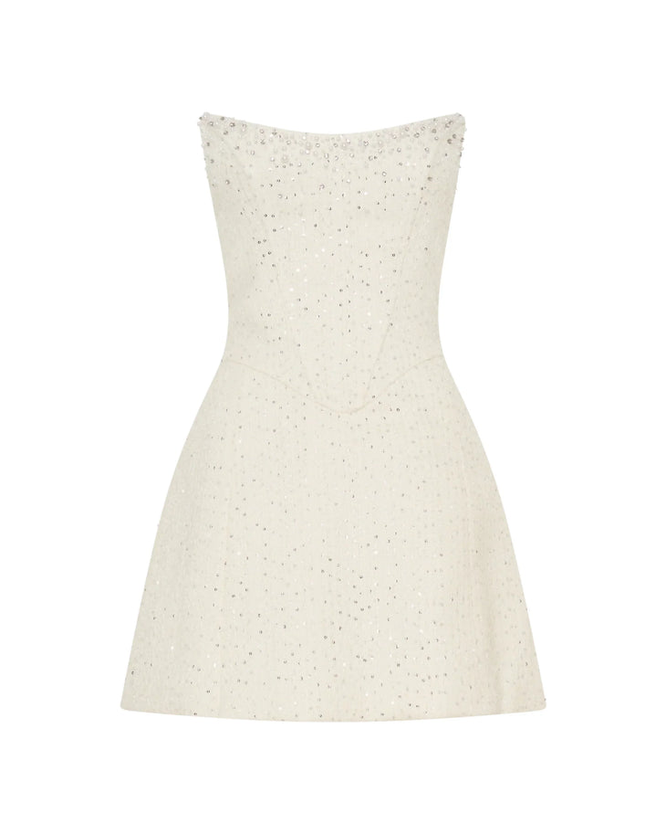 Woman wearing white strapless tweed corset mini dress against black background — Meshki | Endless UAE