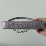 Mini Rachel Lilac Croco Embossed Leather Bag held in hand against white background — By Far | Endless UAE