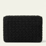 Black woven raffia clutch bag with textured basket weave pattern and structured rectangular shape — Jimmy Choo | Endless UAE