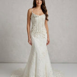 Ivory mermaid wedding gown with beaded bodice and embellished skirt — Enzoani | Endless UAE