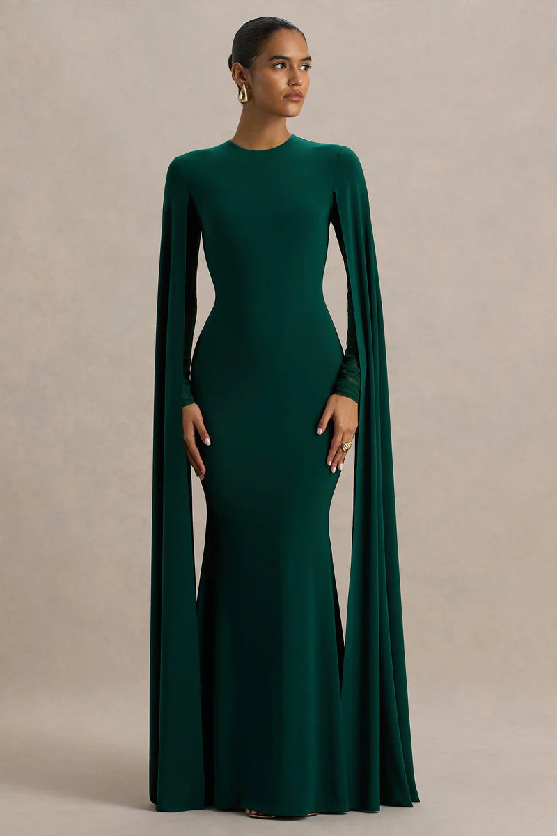 Woman wearing bottle green maxi dress with cape sleeves and crew neckline — Club L London | Endless UAE