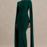 Woman wearing bottle green maxi dress with cape sleeves and crew neckline — Club L London | Endless UAE
