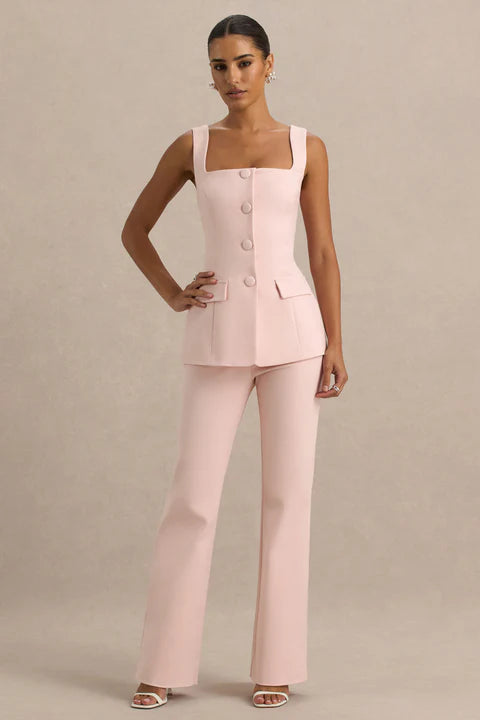 Pale pink sleeveless button-front vest with matching bootcut trousers, worn with nude heeled sandals — Club L London | Endless UAE