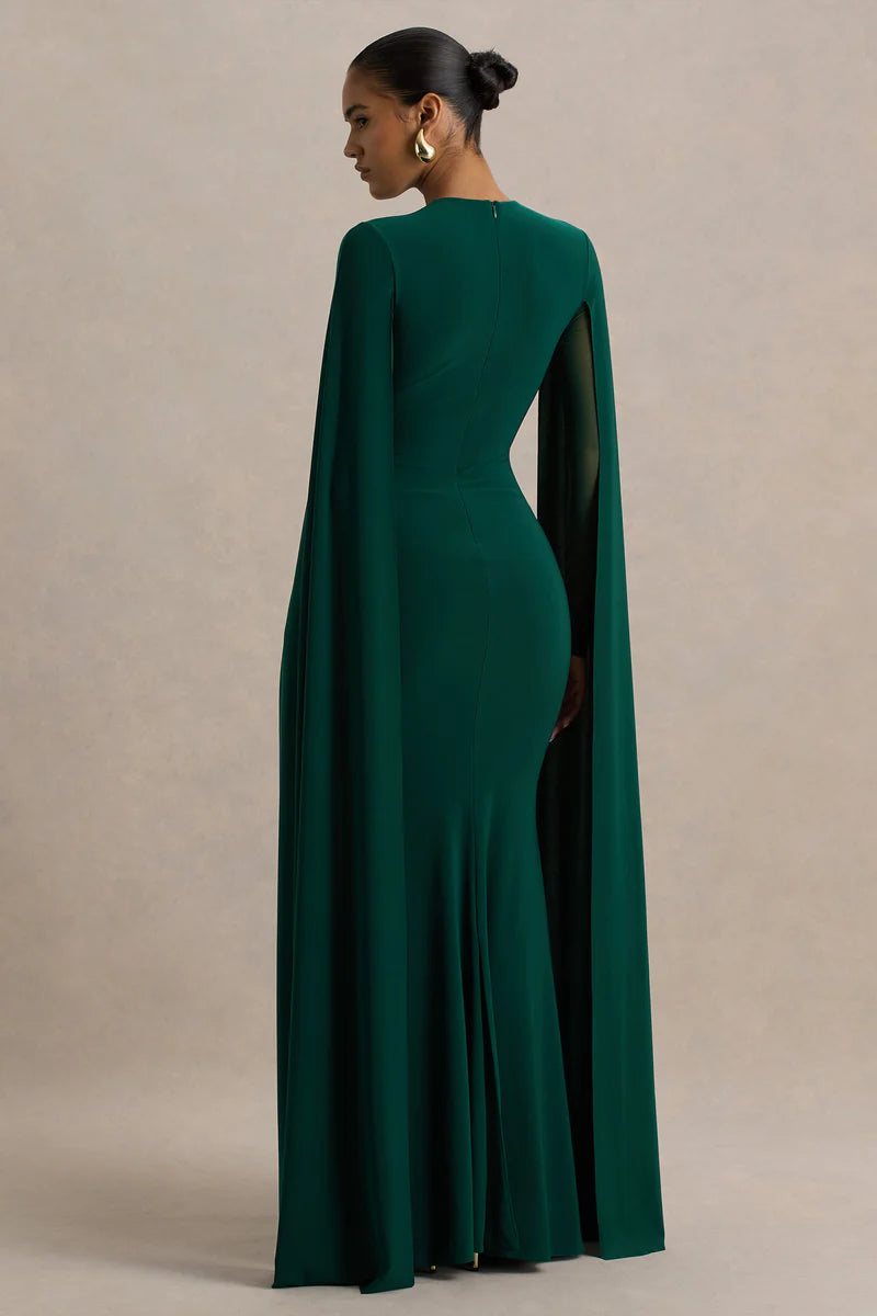 Woman wearing bottle green maxi dress with cape sleeves and crew neckline — Club L London | Endless UAE
