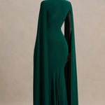Woman wearing bottle green maxi dress with cape sleeves and crew neckline — Club L London | Endless UAE