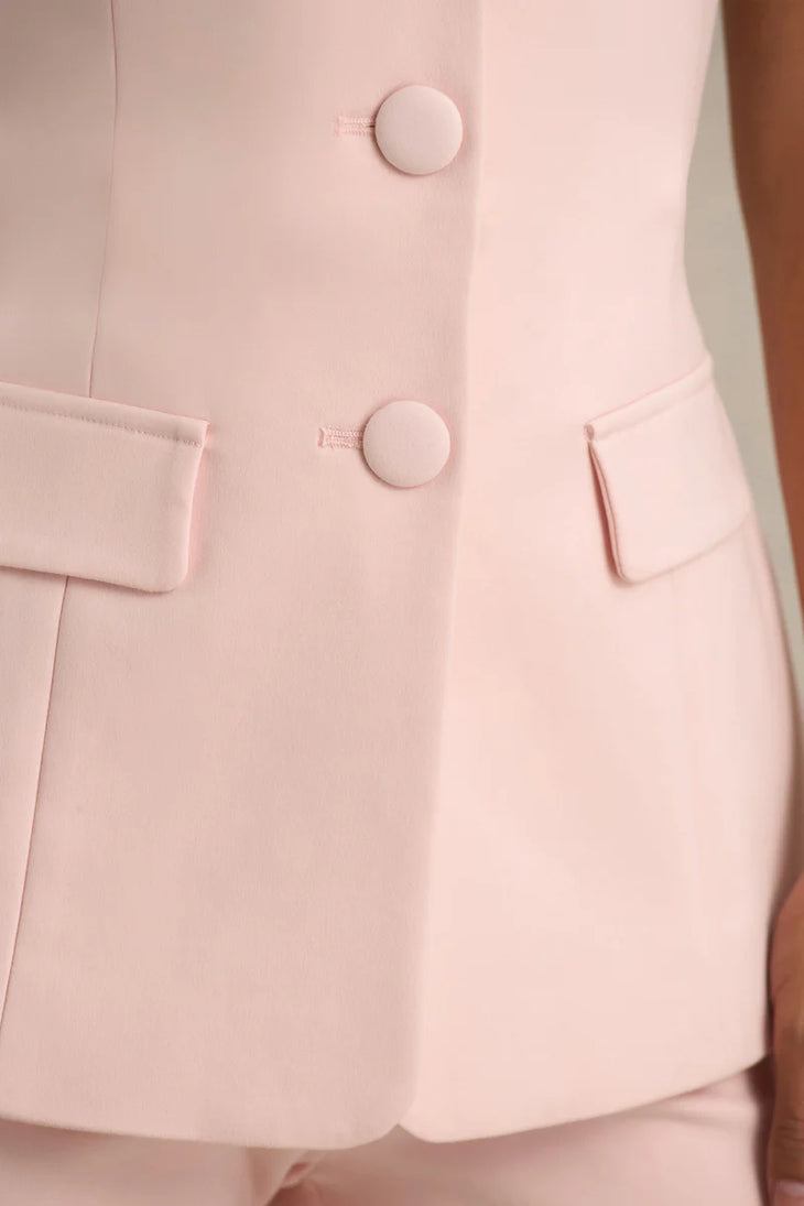 Light pink blazer detail showing covered buttons and patch pocket on Aceline jacket — Club L London | Endless UAE