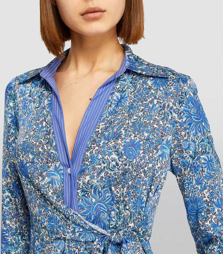 Woman wearing blue floral print midi dress with collar and long sleeves — Sandro | Endless UAE