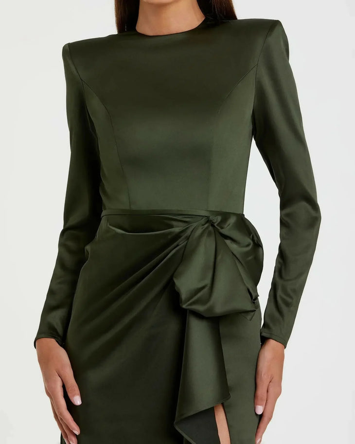 Olive green long sleeve satin gown with structured shoulders and dramatic draped bow detail — Mac Duggal | Endless UAE