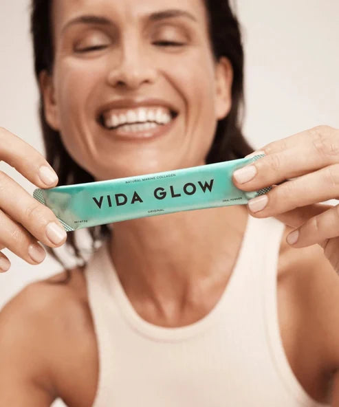 Vida Glow Natural Marine Collagen sachets in turquoise packaging with product box — Powder Beauty | Endless UAE