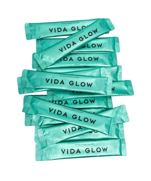 Vida Glow Natural Marine Collagen sachets in turquoise packaging with product box — Powder Beauty | Endless UAE