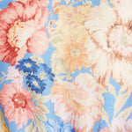 Belted floral-print linen mini dress in blue with long sleeves and bow detail — Zimmerman | Endless UAE