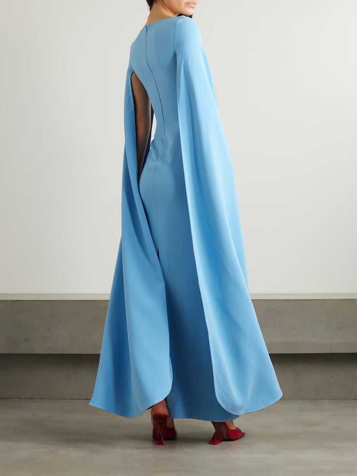 Sky blue cape-sleeve maxi dress with open back detail and floor-length silhouette — Solace London | Endless UAE