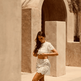 White Floral Mini Skirt - Endless - UAE Rental and Resale for Women's Fashion