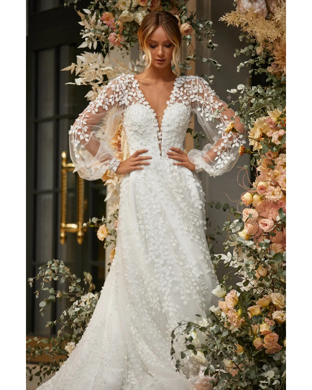 Marcy white lace wedding dress with sheer floral sleeves and plunging neckline — Katy Corso | Endless UAE