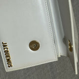 White leather shoulder bag with gold Jacquemus logo — Jacquemus | Endless UAE