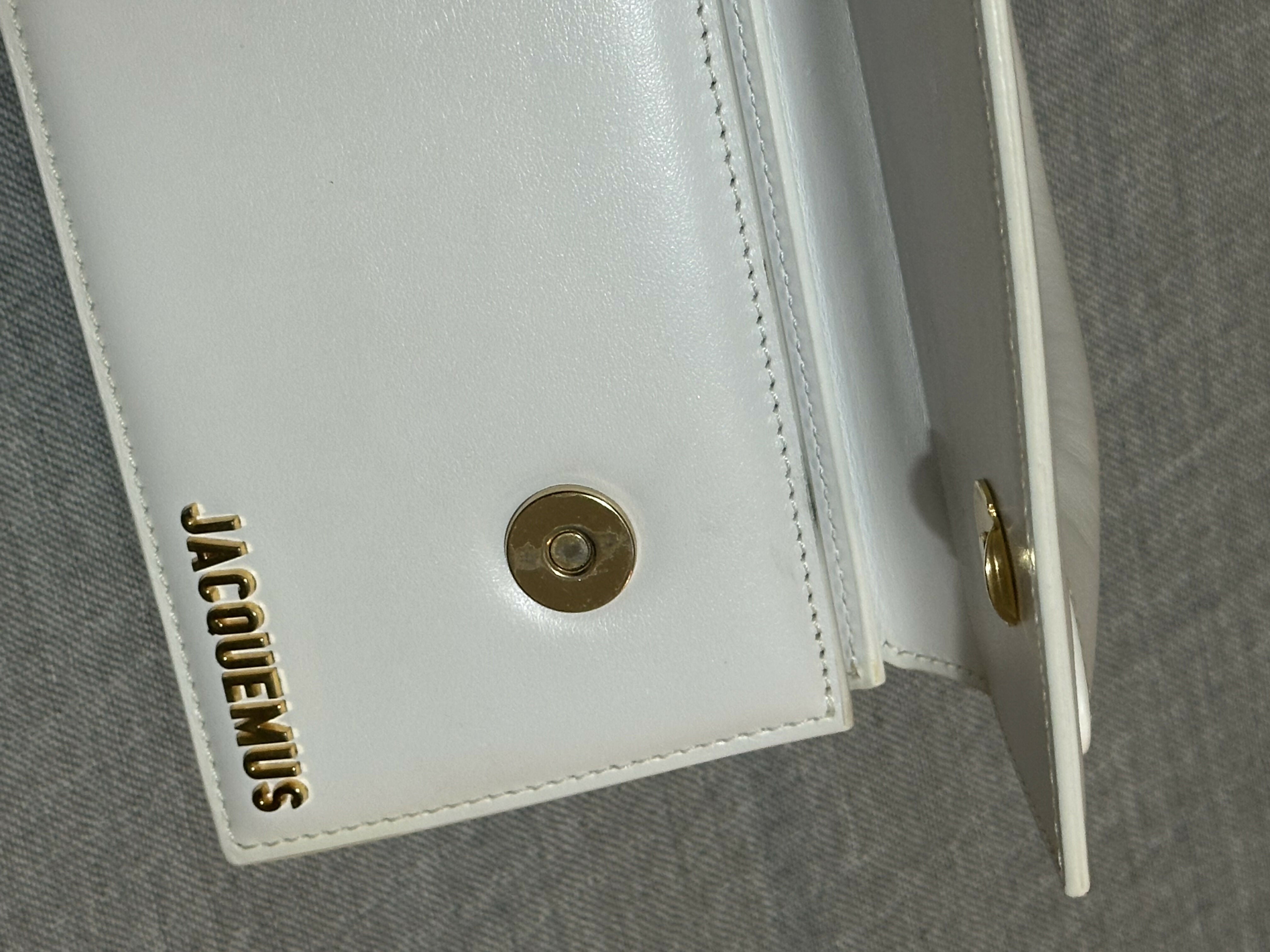 White leather shoulder bag with gold Jacquemus logo — Jacquemus | Endless UAE