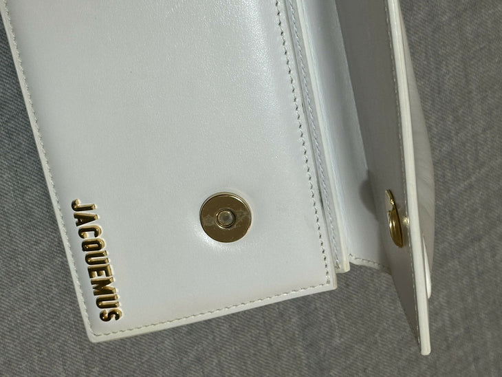 White leather shoulder bag with gold Jacquemus logo — Jacquemus | Endless UAE