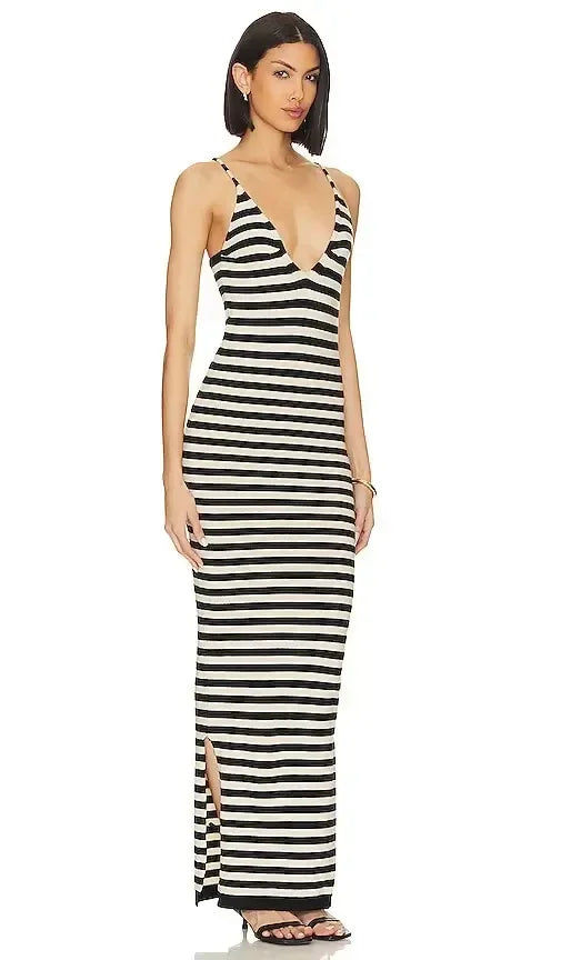 Black and white striped maxi dress with deep V-neckline and side slit — SNDYS | Endless UAE