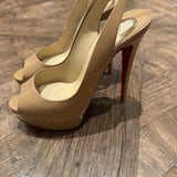 Nude patent leather peep-toe sling-back pumps with red sole — Christian Louboutin | Endless UAE